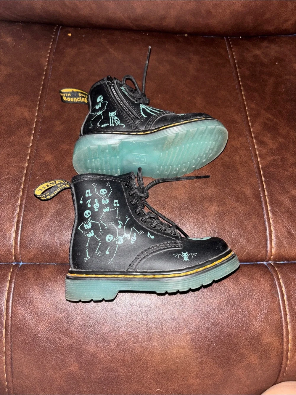 Dr. Martens Kids Black Boots with Teal Skull Accents
